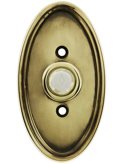 Solid Brass Oval Style Buzzer Button in Antique Brass.
